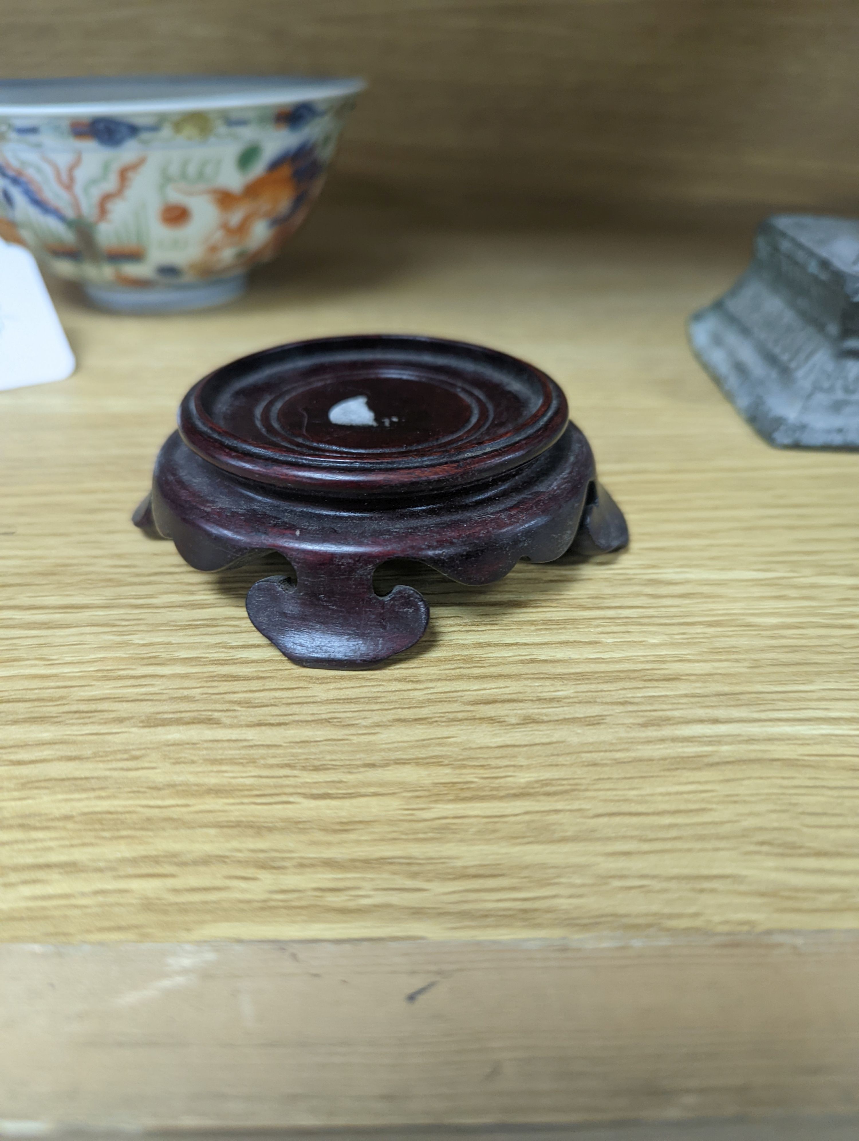 A Wucai bowl, dragon and flamingo pearl decoration, Jiaqing mark, on wood stand. 16cm diameter